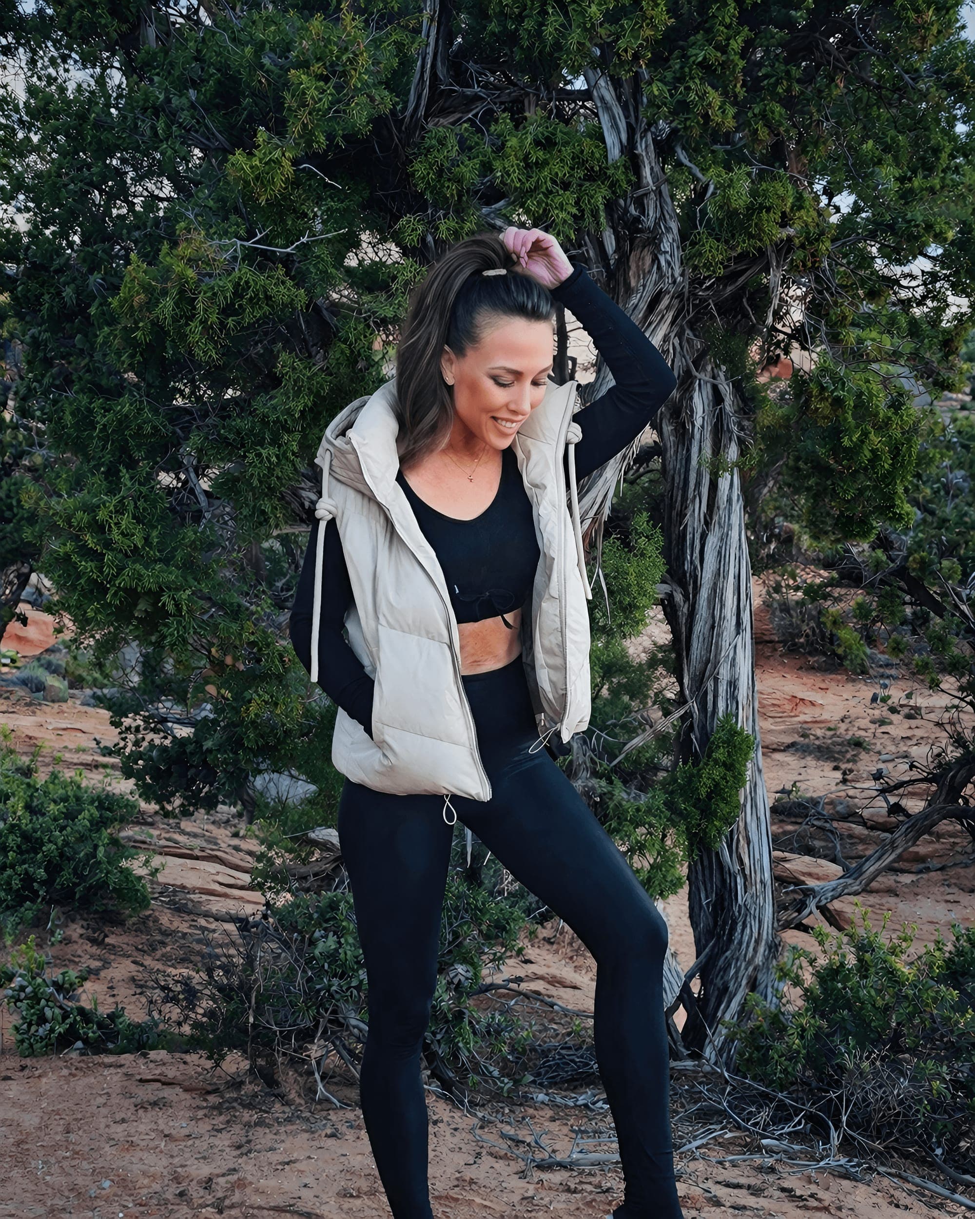 MJ Grace sitting on rocks
