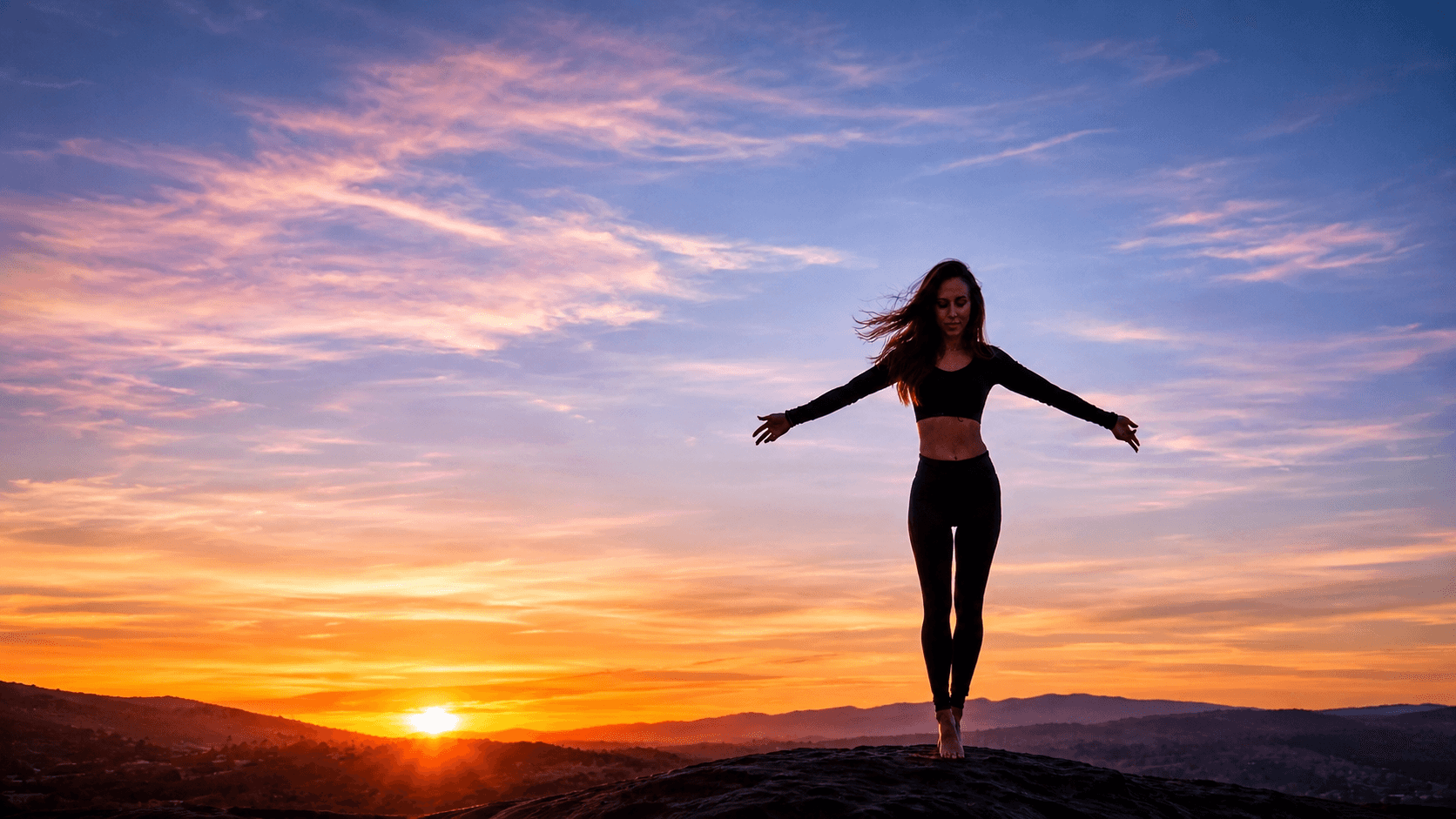 MJ Grace - sunset silhouette, arms wide open
